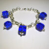 Bracciali Charms in Vetro di Murano colore blu trasparente a cubi