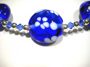 Collane in Vetro di Murano tre perle colore blue trasparente con fiore